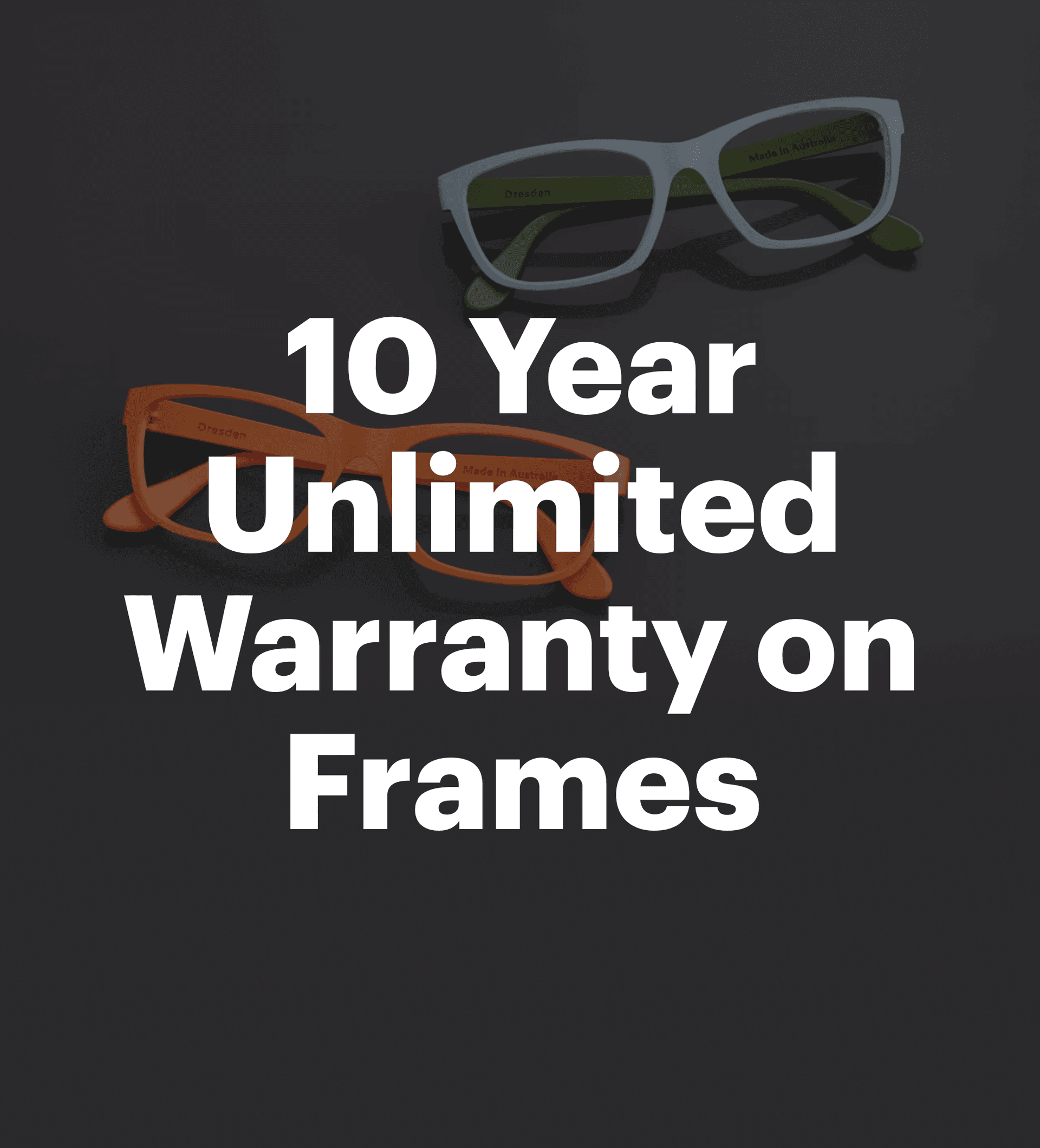 Two pairs of Dresden Vision frames, one orange and one light blue, lying on a dark surface, showcasing the interchangeable temples and robust construction of the core eyewear product.