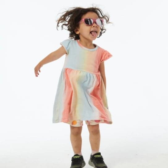 A lively child showcasing Dresden Vision United States kids glasses, built for active little ones. Explore stylish and impact-resistant childrens eyewear with comfortable, flexible frames.